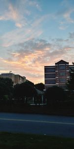 View of city against sky during sunset