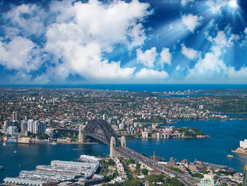 Panoramic view of sea and buildings against sky