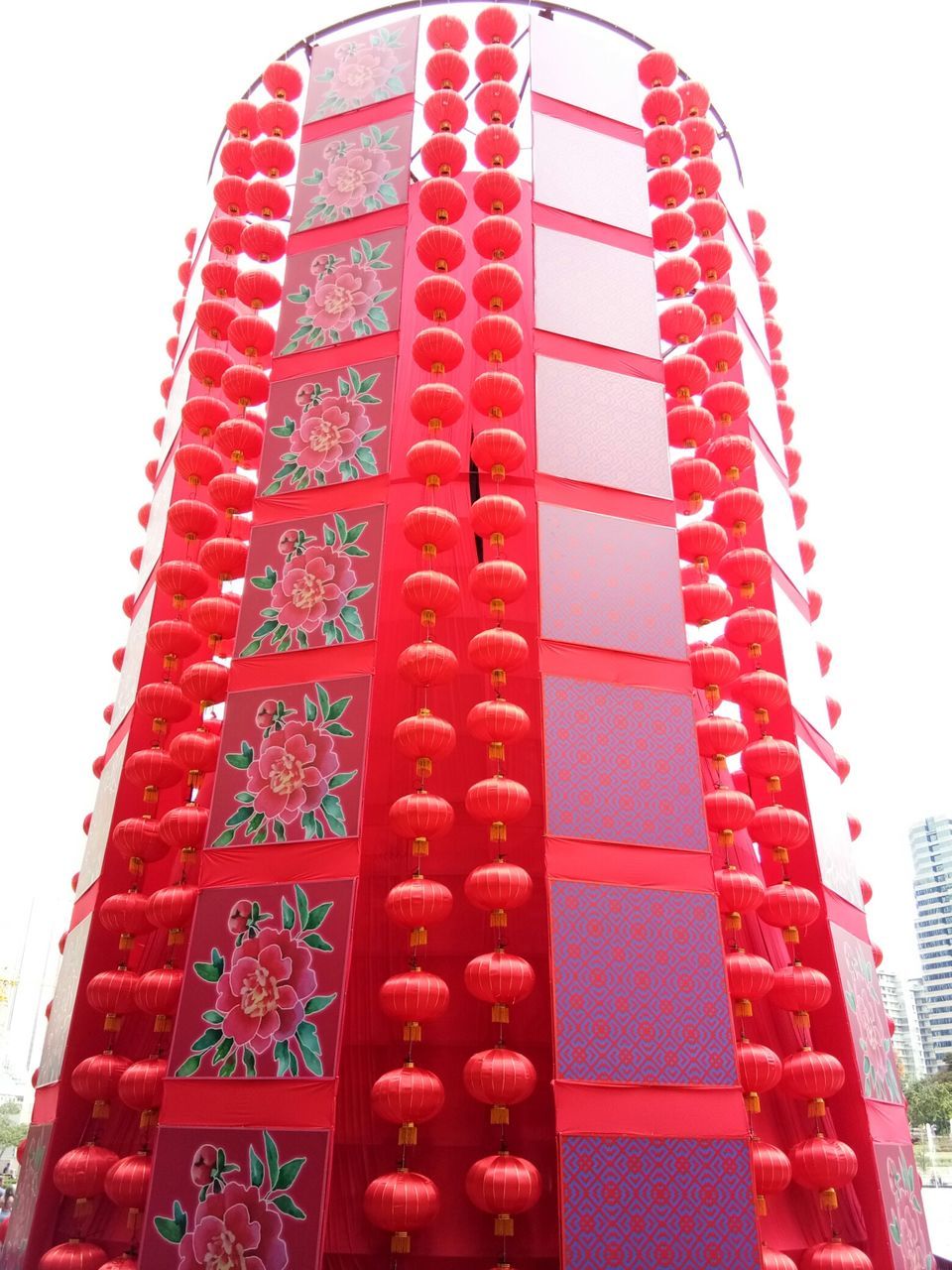 LOW ANGLE VIEW OF RED SKYSCRAPER