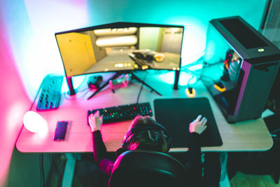 Man using laptop on table