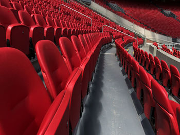 High angle view of empty chairs in stadium