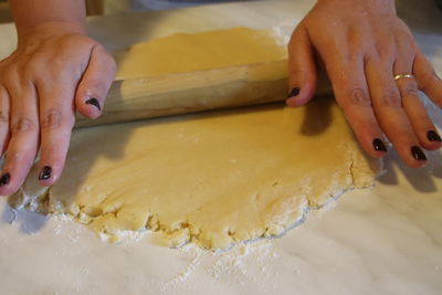 Close-up of people preparing food