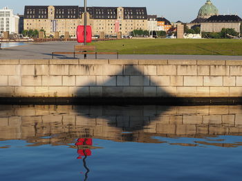 Buildings in distance with waterfront