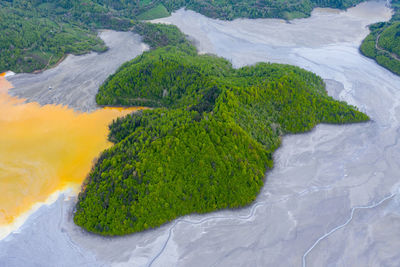 Aerial view of waste decanting lake, tailing pond. mining water copper pit flooding geamana, romania