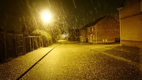 Illuminated street light at night