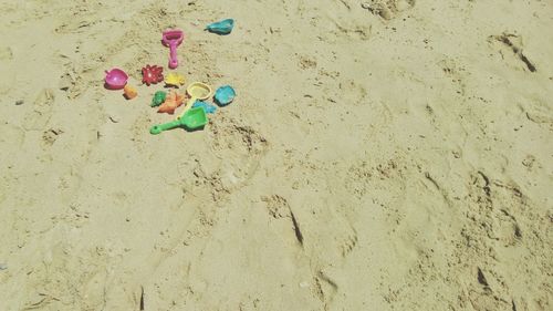 Close-up of multi colored sand on beach