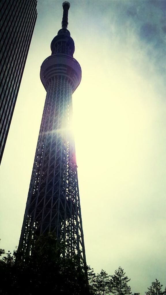 tall - high, tower, architecture, low angle view, built structure, building exterior, skyscraper, city, sky, modern, capital cities, famous place, international landmark, travel destinations, office building, communications tower, tourism, travel, cloud - sky, tall