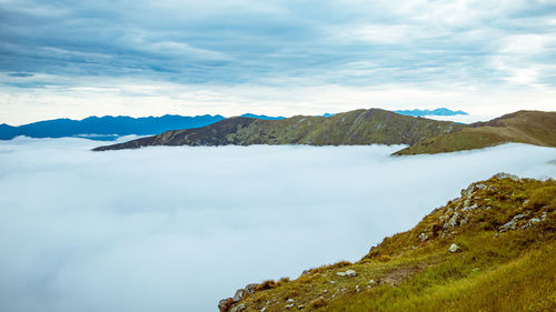 Scenic view of snowcapped mountains against sky