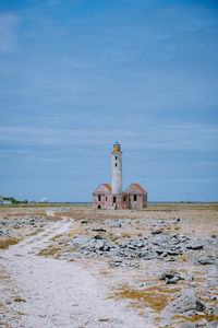 Abandoned building against blue sky