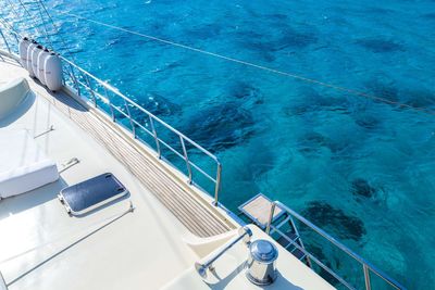 High angle view of sailboat sailing on swimming pool