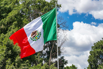 Low angle view of flag against sky