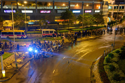 High angle view of people on road at night