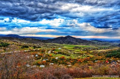 View of landscape against cloudy sky
