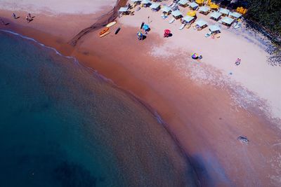Aerial view of beach umbrellas at coastline