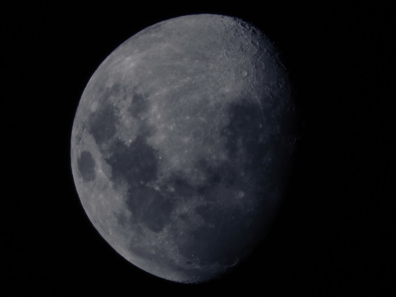 CLOSE-UP OF MOON AGAINST SKY