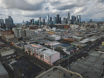 High angle view of buildings in city against sky