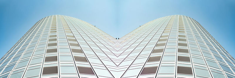 Low angle view of modern building against clear sky