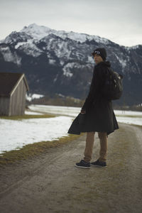 Man standing outdoors during winter