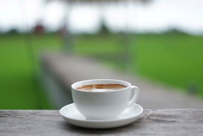 Close-up of coffee cup on table