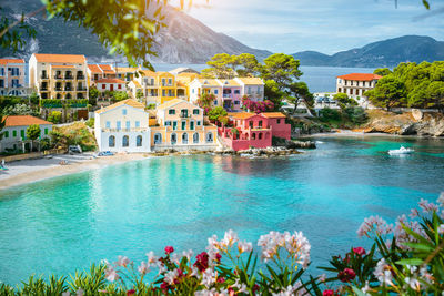 View of swimming pool by buildings