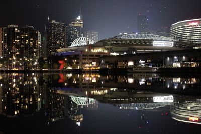 Illuminated buildings in city at night