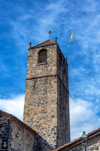 Low angle view of old building against sky