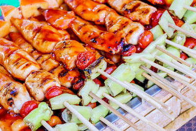 Delicious barbecue skewers close-up