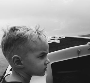 Close-up portrait of boy looking away