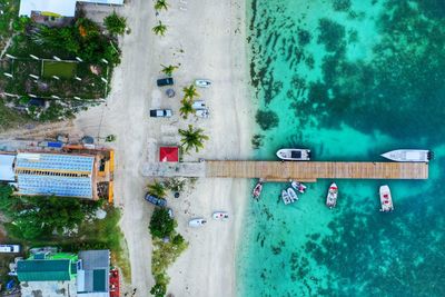 Aerial view of boats moored at pier