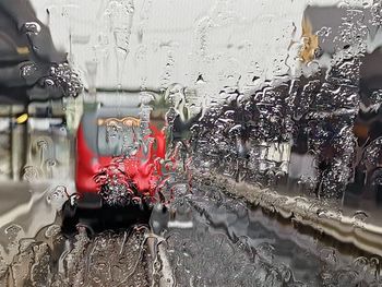 Wet glass window in rainy season