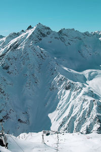 Scenic view of snow covered mountains