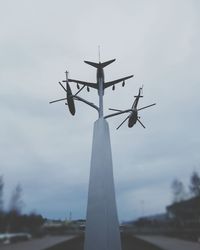 Low angle view of wind turbine against sky