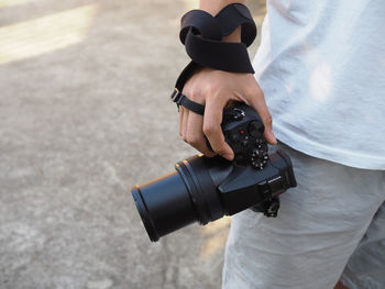 Man photographing camera