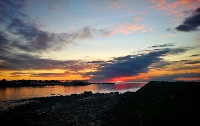 Scenic view of sea against sky during sunset