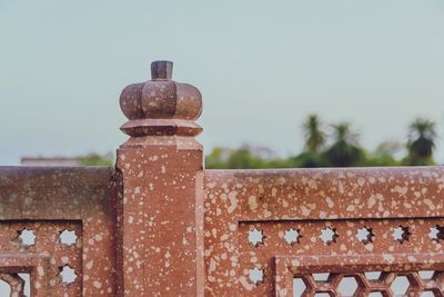 Close-up of rusty metal against clear sky