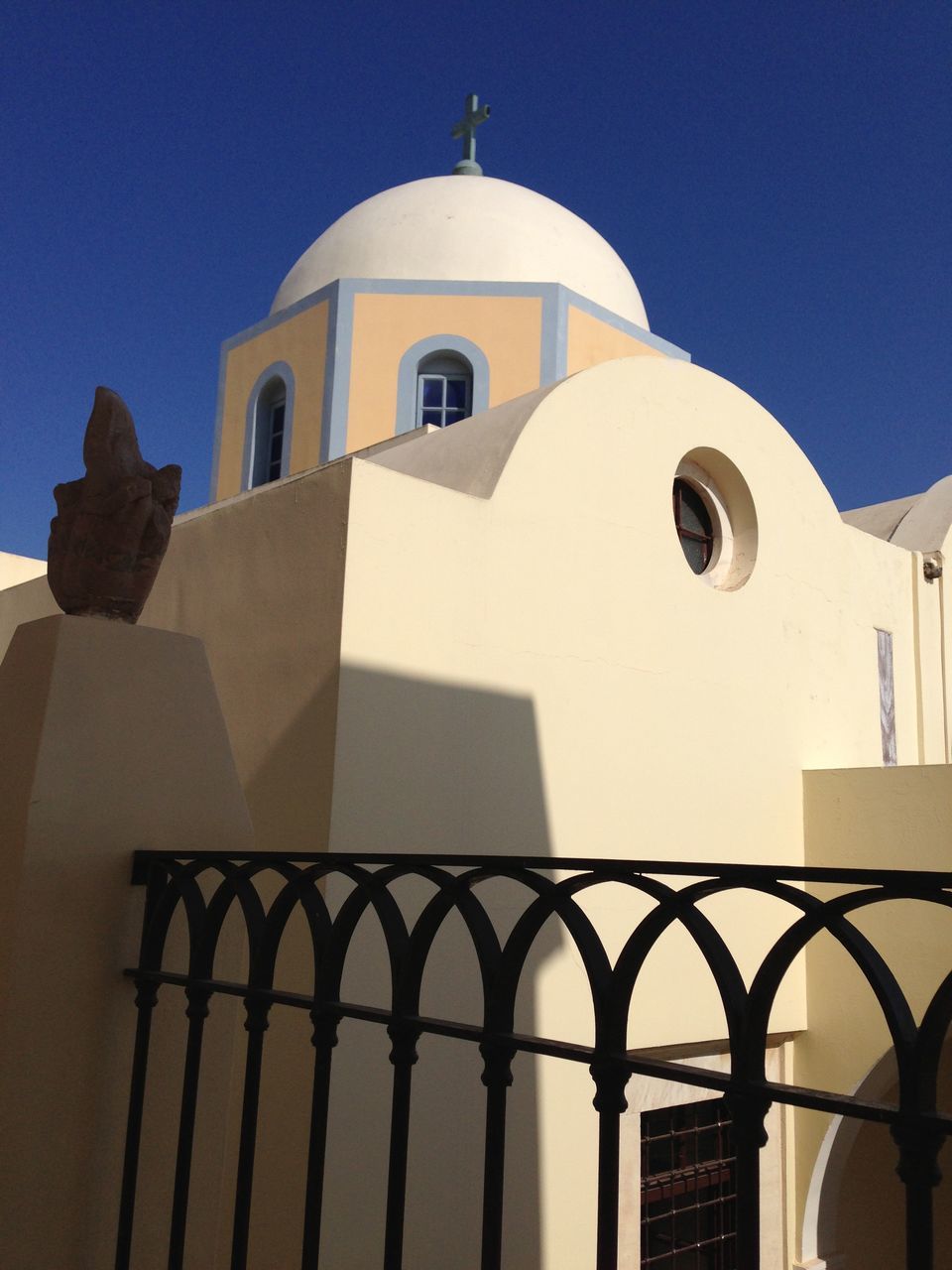 religion, architecture, sunlight, built structure, building exterior, low angle view, place of worship, no people, outdoors, sky, spirituality, whitewashed, dome, day