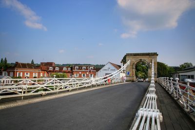 Road passing through city buildings