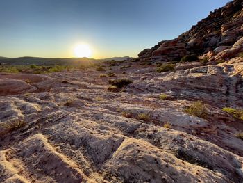 Scenic view of mountains against sky during sunset