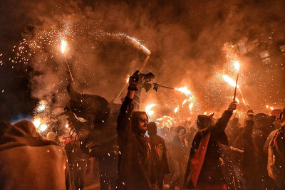 Firework display at night