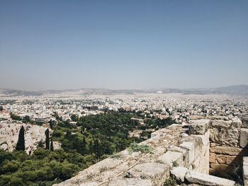 Aerial view of cityscape against clear sky