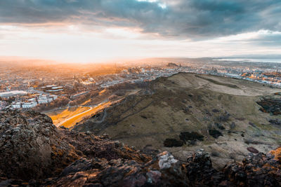 Aerial view of townscape against sky during sunset