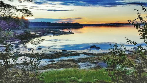 Scenic view of sea at sunset