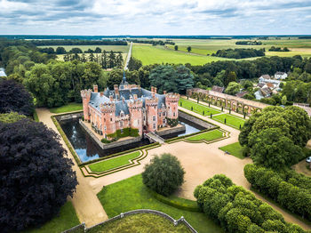 High angle view of palace amidst over pond amidst garden