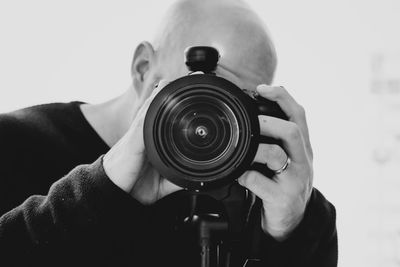 Man photographing camera