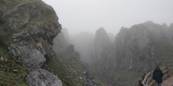 Panoramic view of rocky mountains against sky