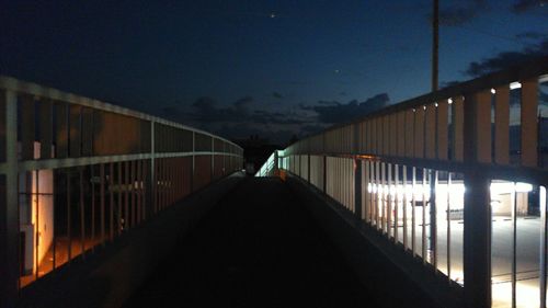 View of footbridge at night