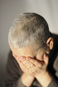 Close-up of young man looking away