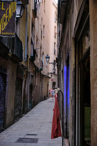 Alley amidst buildings in city