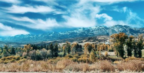 Scenic view of snowcapped mountains against sky