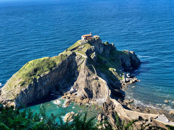 High angle view of rock formations at shore